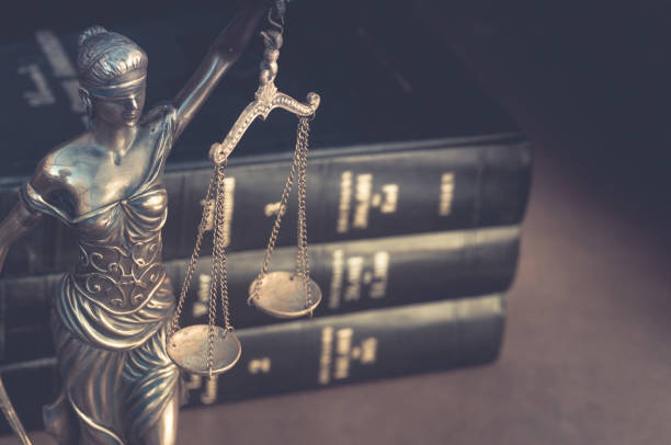 Legla law concept image, scales of justice and books